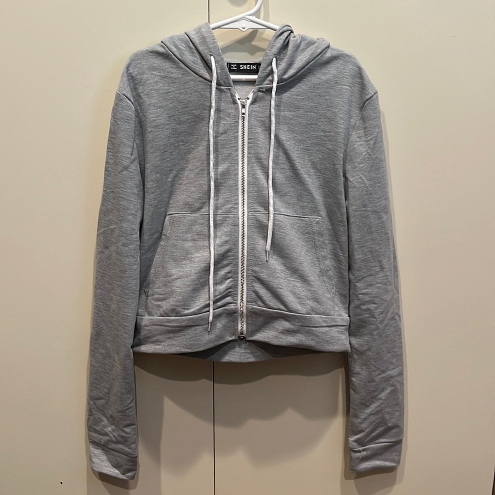 Cropped light grey zipped up hoodie from Shein. Size Womens XS.